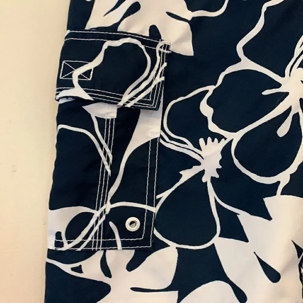 3/$30 Old Navy navy and white boys swim trunks with pockets. Size L( 10-12 )